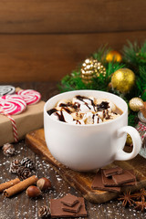 Cup with Christmas hot Chocolate drink, Marshmallows and cinnamon