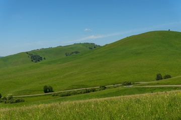 road meadows mountains hills