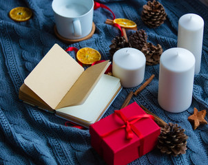 cup of tea and pine cones with christmas decoration