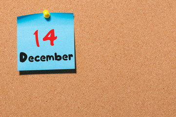 December 14th. Day 14 of month, Calendar on cork notice board. Winter time. Empty space for text