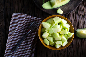 Healthy fruit ripe melon dark tone background