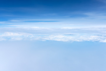Fototapeta na wymiar blue sky and clouds view from airplane