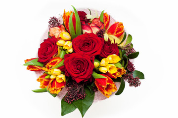 Floral bouquet of roses, tulips and freesia isolated on white background