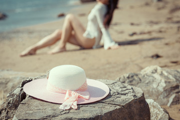 Fototapeta na wymiar Happy woman enjoying beach relaxing joyful in summer by tropical