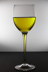 one glass with wine on the table