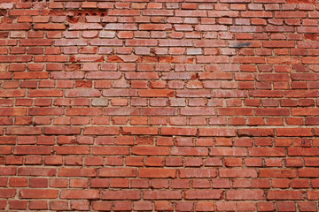 old brick wall with destruction