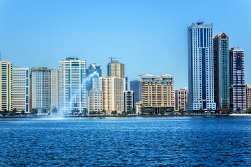 Fototapeta na wymiar Skyscrapers in Khalid Lagoon in Sharjah city. UAE