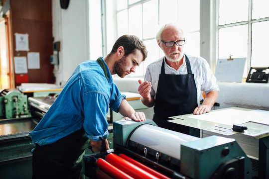 Men working in printing shop