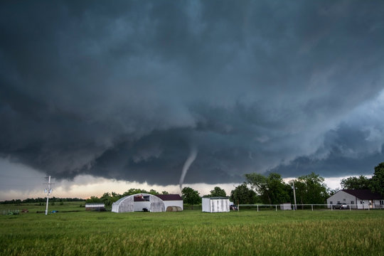 A tornado rated EF4 - with winds 166 to 175 miles per hour - striking a neighbourhood in Katie, Oklahoma