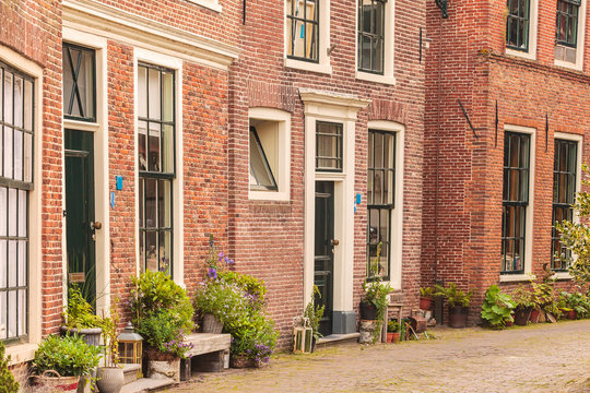 View at old houses in the Dutch city of Blokzijl