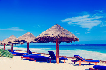 chairs on exotic tropical white sand beach