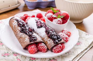 Cocoa pancakes with berries