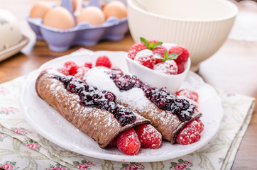 Cocoa pancakes with berries