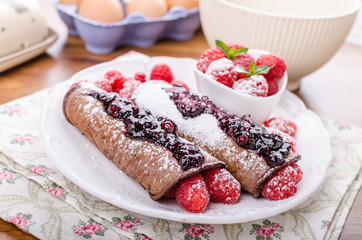 Cocoa pancakes with berries