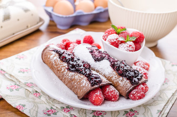 Cocoa pancakes with berries