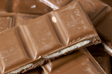 Close-up of heap of filled chocolate bars. Food background