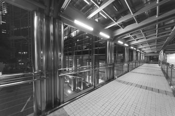 Empty pedestrian transition over busy street in urban city