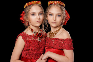 beautiful  little girls in red dresses