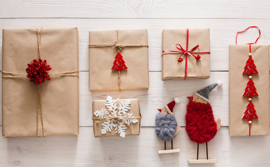 Christmas presents background on white wood