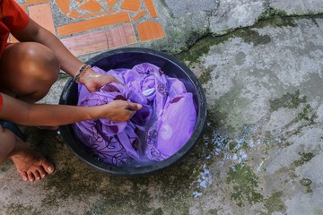 Woman work clothing wash in basin black for cleansing, Thailand style ancient