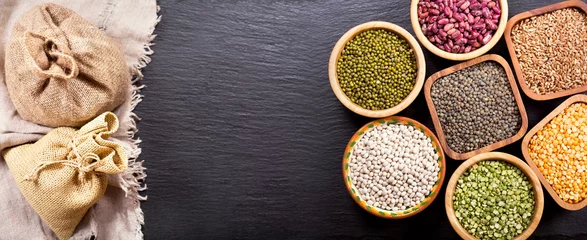 Foto auf Acrylglas various cereals, seeds, beans and grains © Nitr