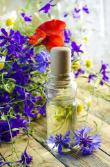 Obraz na płótnie Canvas aromatic oil with the scent of flowers