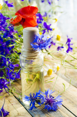 Obraz na płótnie Canvas aromatic oil with the scent of flowers