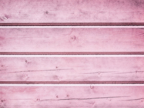 Pink painted wood board background texture