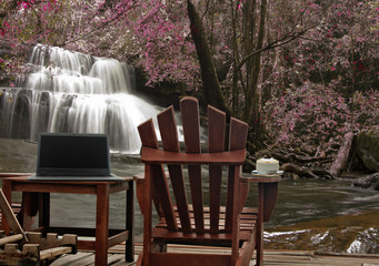 Fototapeta premium Office out door in autumn forest at pang sida waterfall National Park sa kaeo Thailand