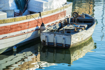Fototapeta na wymiar raditional fishing boats in Livorno port, Tuscany, Italy.