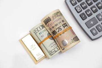 Fototapeta premium gold bar and bills