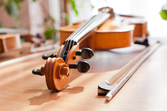 Fingerboard violin close-up lying on the table