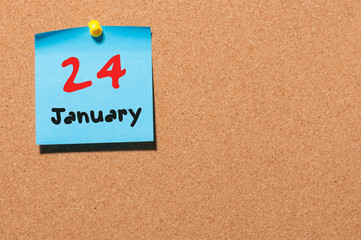 January 24th Eve Christmas. Day 24 of month, Calendar on cork notice board. New year time. Empty space for text