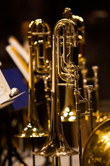 Trombones on stage in Symphony orchestra in dark colors © furtseff