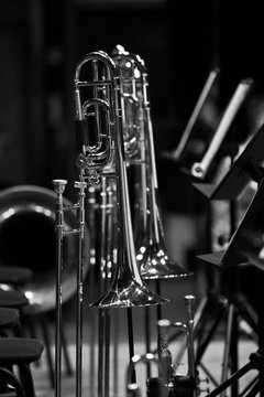  Trombones on stage in a symphony orchestra in black and white
