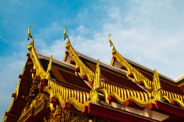 Fototapeta premium The top roof of church of buddhism ,Wat Phra That Choeng Chum
