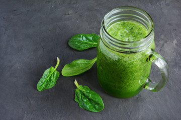 Green smoothie of fresh spinach
