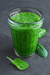 Green smoothie of fresh spinach
