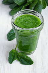Green smoothie of fresh spinach