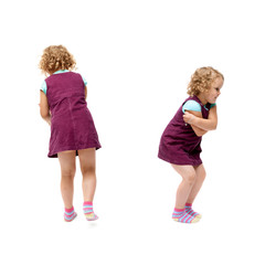 Young little girl standing over isolated white background