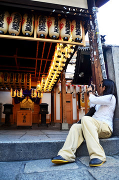 Traveler thai woman use camera shooting photo Japanese lantern o