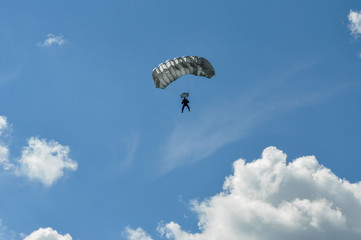 Parachutist and sky