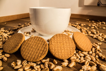 Cookies and puffed grains on the wood