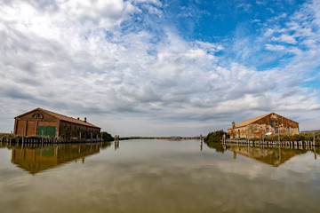 comacchio valley fisherman house on cloudy sky background