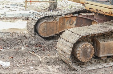 Fototapeta na wymiar caterpillar of the excavator. Working outdoor Construction heavy