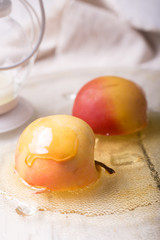 Pieces ripe apple and honey