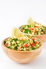 Tabbouleh salad with couscous and vegetables isolated

