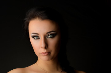 Fototapeta premium Portrait of beautiful young woman with makeup