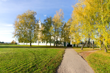 Autumn road in Konstantinovo village with Russian church at background from 18th century. The place where famous poet Esenin lived - Rybninskiy Region, Europe