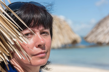 Woman palm beach umbrella